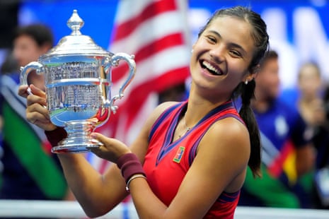 Emma Raducanu celebrates with the trophy after winning the 2021 U.S. Open women's title