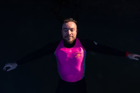 Graham Russell floats in the ocean