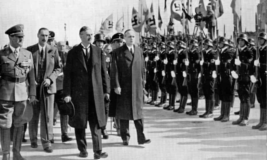 Adolf Hitler, Neville Chamberlain and Joachim von Ribbentrop at Munich, 1938.
