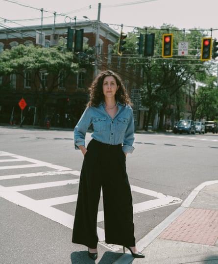 Leah Conlin, a resident of Rhinebeck, New York, standing in a street