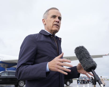 Mark Carney speaks with reporters media before he boards a flight to Malaysia, 24 October 2025.