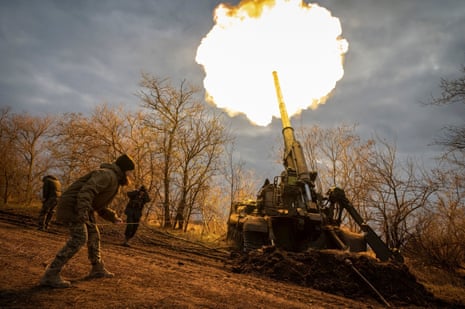Ukrainian servicemen fire a 2S7 Pion self-propelled gun at a position on a frontline in the Kherson region on 9 November.