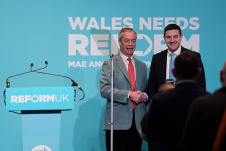 Former Conservative politician James Evans who has been unveiled by Reform UK leader Nigel Farage (left) as the latest defector to Reform UK before the Senedd elections in Wales in May.