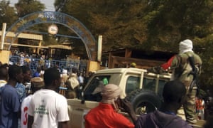 A military truck arrives outside a hospital in Gao where injured personnel were taken after the explosion.