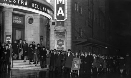 A long queue outside London’s Brixton Astoria music hall in 1930.