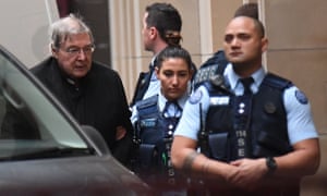 Cardinal George Pell arrives at court for his appeal hearing. His legal team argued it was improbable he assaulted two choirboys after Sunday mass in 1996