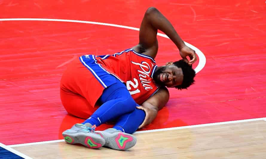 Philadelphia 76ers' Joel Embiid out at least two weeks with bone bruise | Philadelphia 76ers | The Guardian