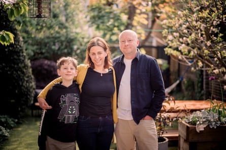 Toby with Sarah and Simon in their sunny garden.