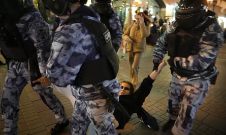 Riot police detain a demonstrator during a protest against mobilisation in Moscow, 21 September 2022.
