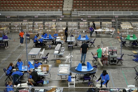 overhead view of people counting ballots