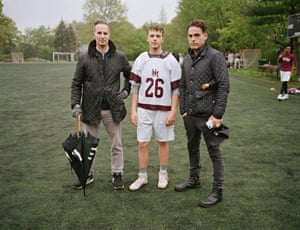 Tom and Mike with their son Jack at a lacrosse practice at Horace Mann School, Bronx, New York