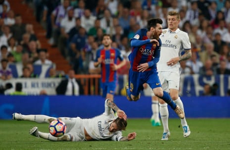 Ramos slides in two footed on Messi and receives a red card.