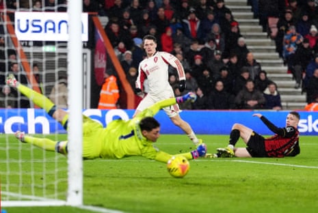 Liverpool's Florian Wirtz has a shot saved by Bournemouth goalkeeper Djordje Petrovic.