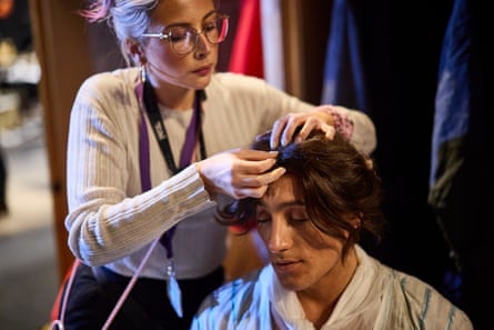 A wig is fitted to help transform Riccardo into the Polish family’s governess