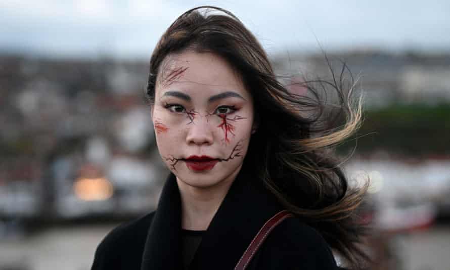 A participant in the biannual Whitby Goth Weekend festival in Whitby, England.