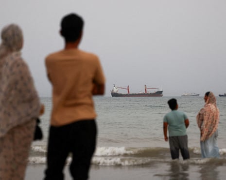 Vessels in the strait of Hormuz seen from the beach at Bandar Abbas, Iran