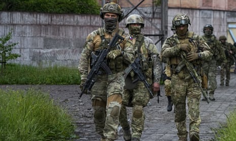 Russian troops  in Mariupol