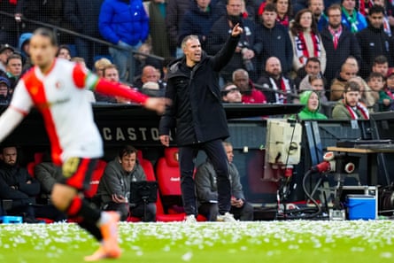 Feyenoord coach Robin van Persie issues instructions to his players during his side’s Eredivisie match against PSV Eindhoven in October 2025
