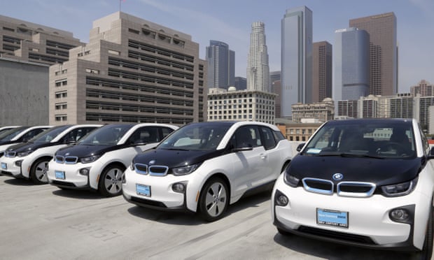 Electric cars are parked atop the police department’s lot in Los Angeles.