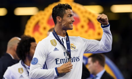 Cristiano Ronaldo with his winner’s medal after the Champions League final, where he scored twice as Real Madrid won 4-1.