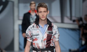 A Prada shirt decorated with the cartoonish graphics that were also on the walls of the catwalk space. 