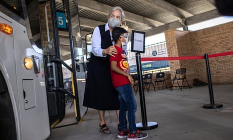 Sister Norma Pimentel escorts a young asylum seeker upon his entry into the US in Brownsville, Texas, in February. 