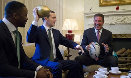 Osborne and guests exchanged a Rugby World Cup 2015 ball for a gold NFL Super Bowl 50 ball.