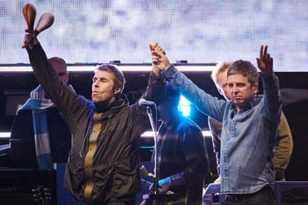 Liam Gallagher and Noel Gallagher of Oasis appear during their reunion tour in Toronto
