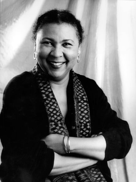 Portrait Of Bell HooksPortrait of American author and feminist bell hooks (born Gloria Jean Watkins) as she smiles, her arms folded, New York, 1980s. (Photo by Anthony Barboza/Getty Images)