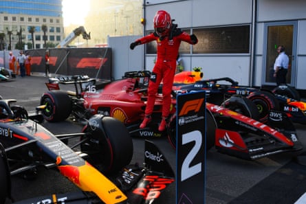Charles Leclerc celebrates after taking pole position