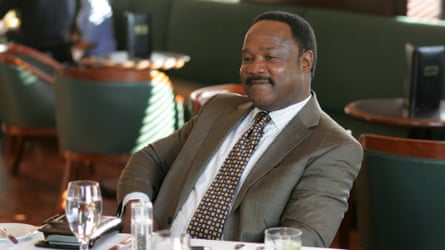 Whitlock pictured in a scene from The Wire playing senator Clay Davis.