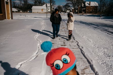 Kaiesha Rivers, center, walks with daughter Jyahri Pye, 11, during a portrait session on Sunday, Jan. 27, 2019 in Highland Park, Mich. Rivers had Jyahri at 32 weeks.