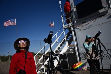 Eclipse photographers prepare their cameras in Albuquerque.