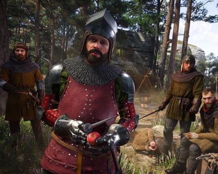 Still from the video game, Kingdom Come Deliverance II, featuring five men dressed in medieval attire looking in the direction of the camera. In the background, a man is tied up on the floor.