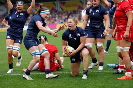 Leia Brebner-Holden of Scotland celebrates after she scores a try against Wales.