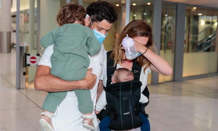 A family are reunited at Perth Domestic Airport in Perth, Australia. Expanded travel exemptions have made it easier for those with strong connections in WA to enter the state but are required to complete 14 days of self-quarantine at a suitable premises.