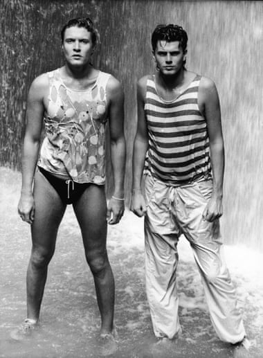 Wet … Simon Le Bon and John Taylor pose on location for a video shoot.