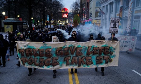 Protesters march against ‘Cop City’ in Atlanta, Georgia, on 21 January. 