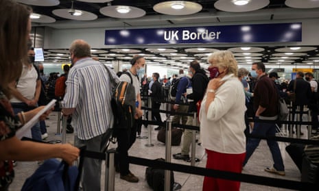 Passengers queueing at Heathrow airport in London earlier this year.