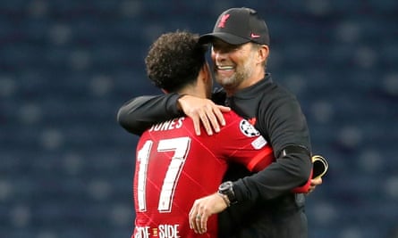 Curtis Jones is embraced by his manager Jürgen Klopp after the game in Porto.