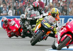 Valentino Rossi (No 46) is pursued by his compatriot Loris Capirossi (No 65) during the 2002 Dutch Grand Prix in Assen. Rossi stormed to the MotoGP championship on his 4-stroke Honda RC211V.