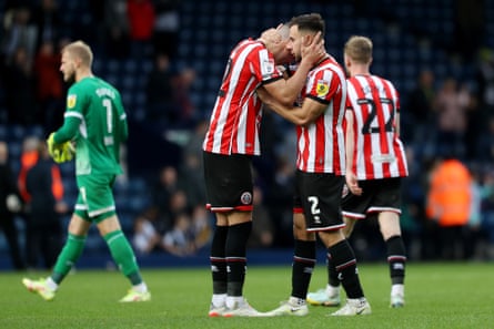 Championship roundup: Anass Zaroury strikes late to keep Burnley on top | Championship 5 Sheffield United players celebrate after their win at West Brom.