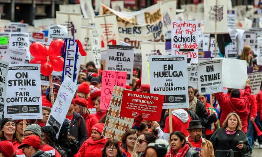 Thousands of Chicago teachers, students and support staff march in October 2019 during the last big wave of school strikes.