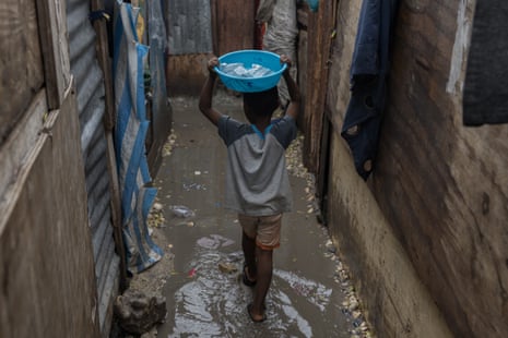 People live in flooded areas under difficult circumstances in Port-au-Prince, Haiti.