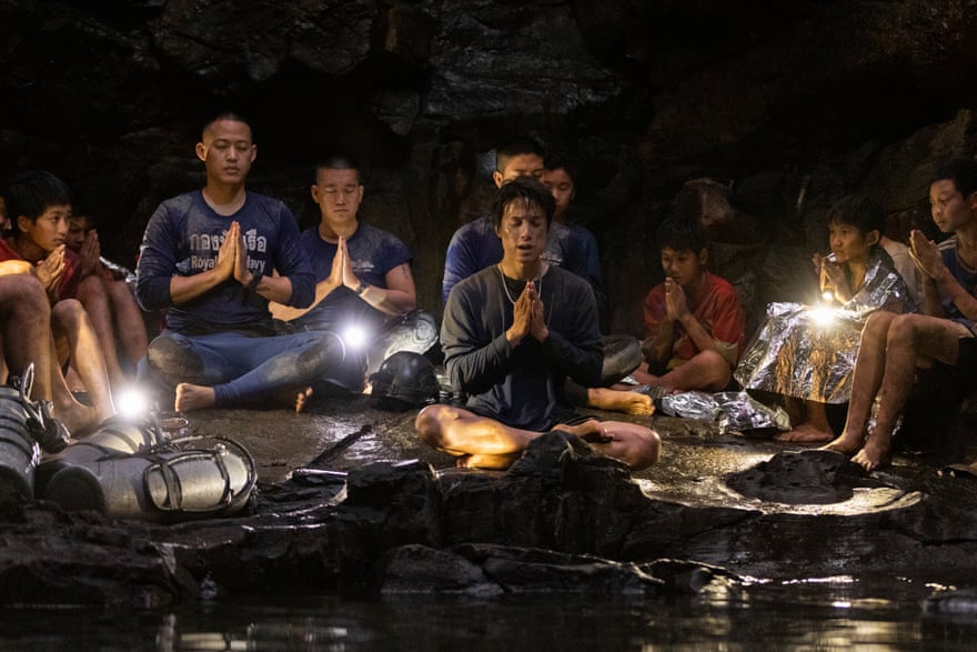 Teeradon ‘James’ Supapunpinyo as Coach Ek leading a meditation session in Thirteen Lives.
