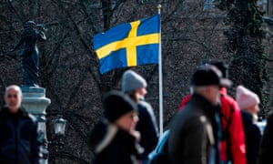 The Swedish flag is seen in Stockholm during the the coronavirus pandemic.