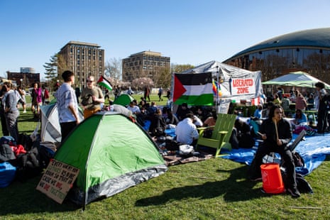 Pro-Palestinian supporters from Harvard University and the Massachusetts Institute of Technology (MIT) rally at MIT at an encampment for Palestine at MIT in Cambridge, Massachusetts, on 22 April 2024.
