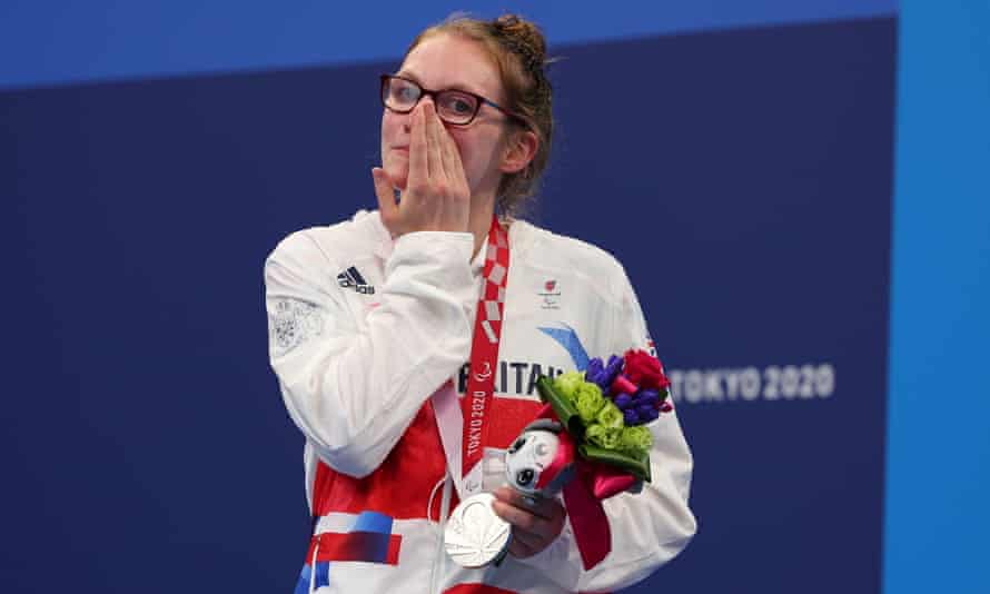 Rebecca Redfern wipes her tears as she celebrates silver in the women's SB13 100m breaststroke final