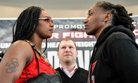 Claressa Shields, left, and Danielle Perkins face off at a press conference on Thursday in Flint, Michigan.