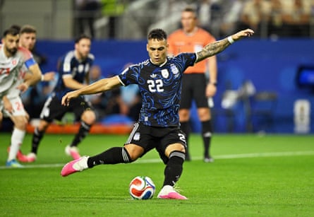Lautaro Martinez takes the penalty shot to give Argentina their second goal